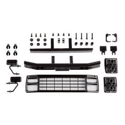Click here to learn more about the Team Associated CR12 Ford F150 Grill & Accessories Set, black.