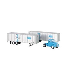 Click here to learn more about the Bachmann Industries HO 1950s/60s Tractor w/2 Trailers, B&M.